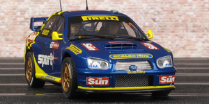 Scalextric C2550 Subaru Impreza WRC - #131 The Sun/Pirelli/Scalextric. 35th place, Wales Rally GB 2003. Rob Gill / Nick Taylor - 03