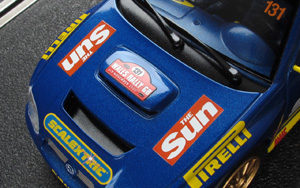 Scalextric C2550 Subaru Impreza WRC - #131 The Sun/Pirelli/Scalextric. 35th place, Wales Rally GB 2003. Rob Gill / Nick Taylor - 10